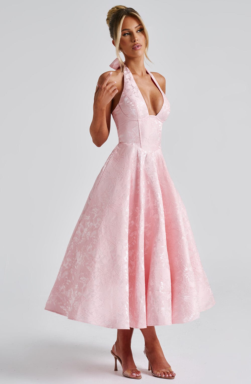 Chic sleeveless halter midi dress for women, ideal for cocktail parties & formal occasions.