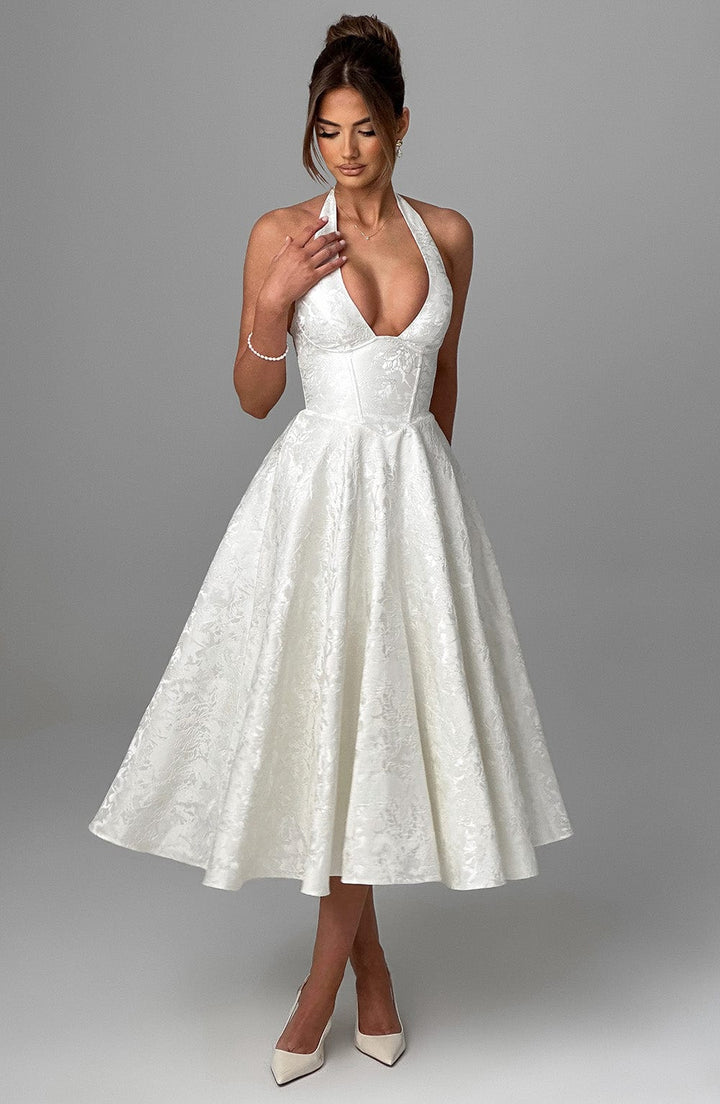 Women's formal halter neck midi dress, ideal as a wedding guest or party dress.