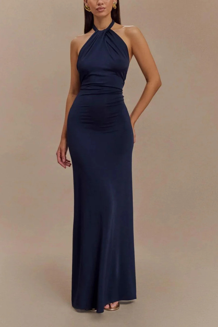 Trendy women's party maxi dress, bodycon fit, halter neck, twisted knot detail & elegant open back design.