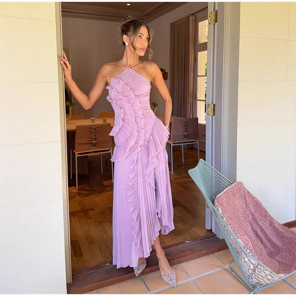 Elegant women's halter neck floral maxi dress, perfect for summer events or vacation. Flowy, sophisticated style.