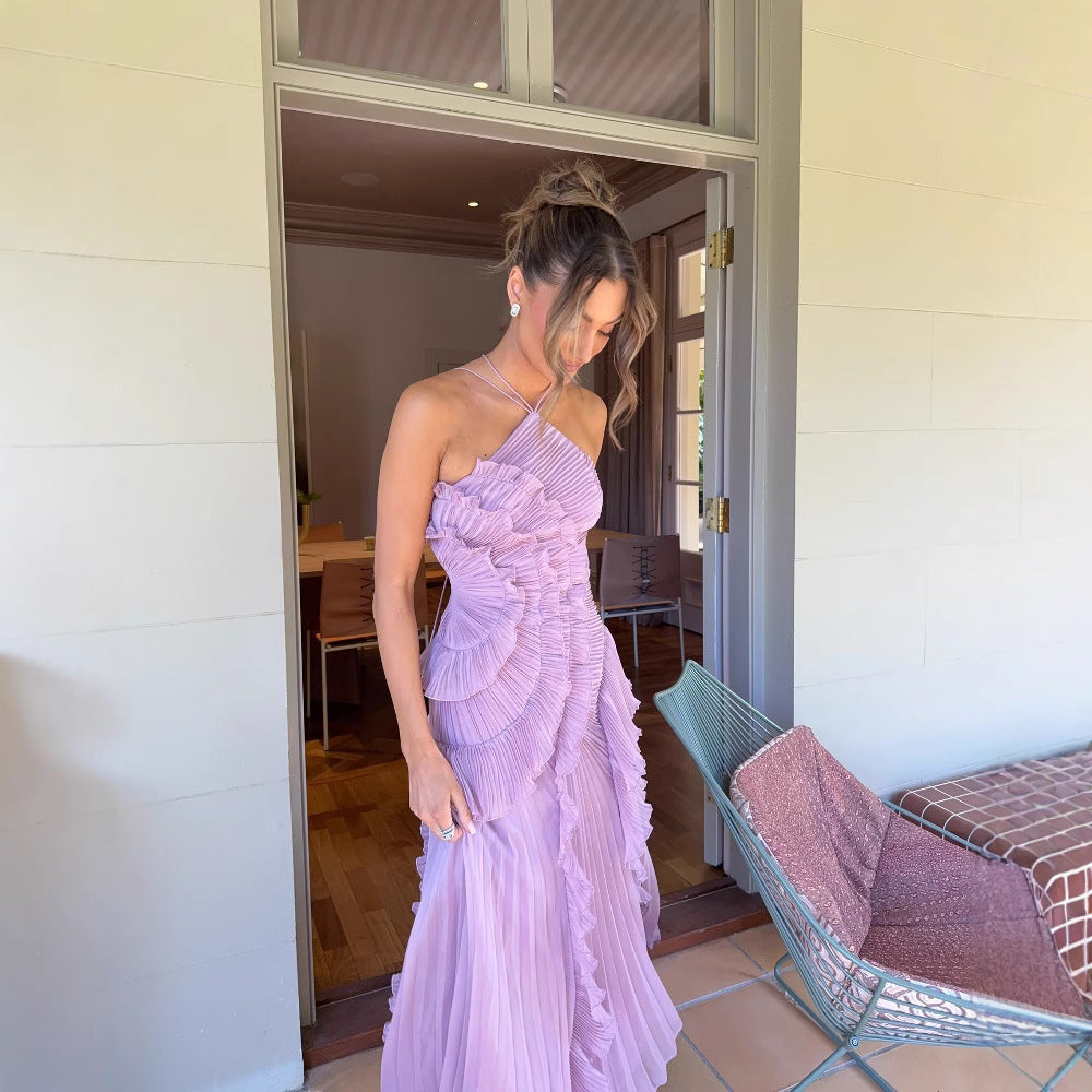 Chic floral summer maxi dress for women with a flattering halter neck. Ideal for casual outings or elegant vacation wear.