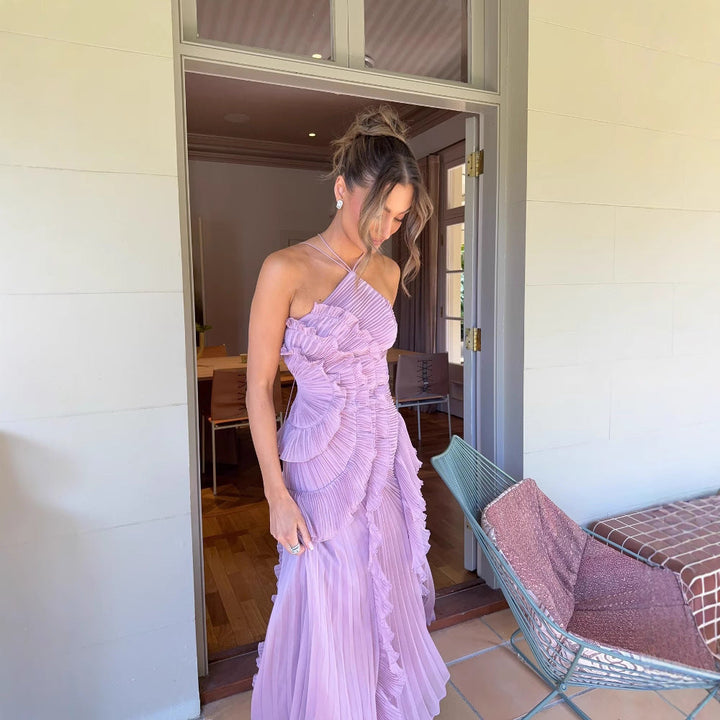Chic floral summer maxi dress for women with a flattering halter neck. Ideal for casual outings or elegant vacation wear.