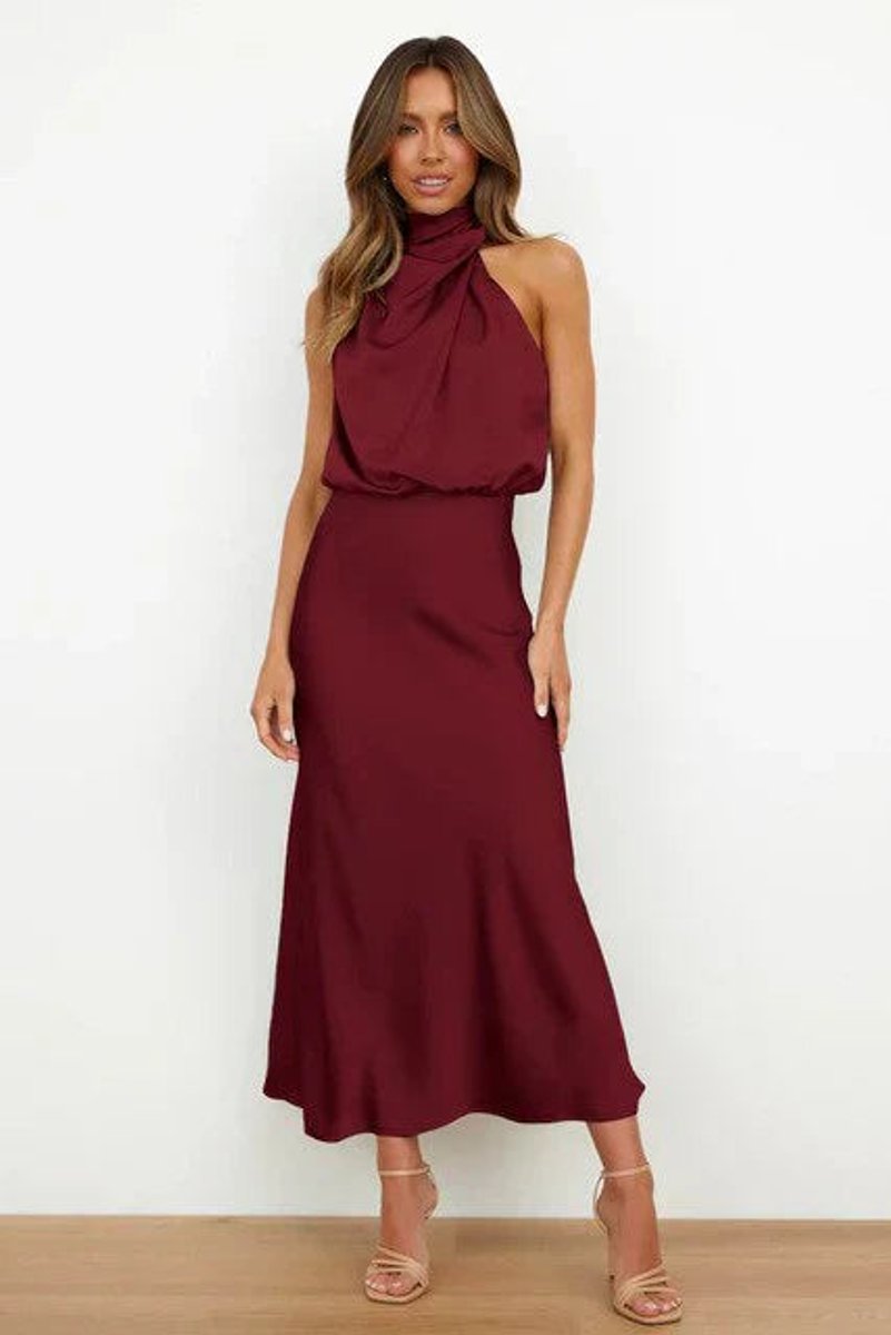 Stylish women's halter evening gown. This midi formal dress is perfect for cocktail parties & special occasions.