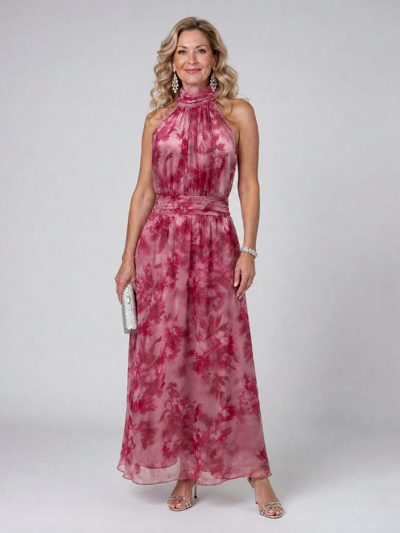 Elegant women's halter neck midi dress in flowing, comfortable fabric. Perfect for summer and occasions.