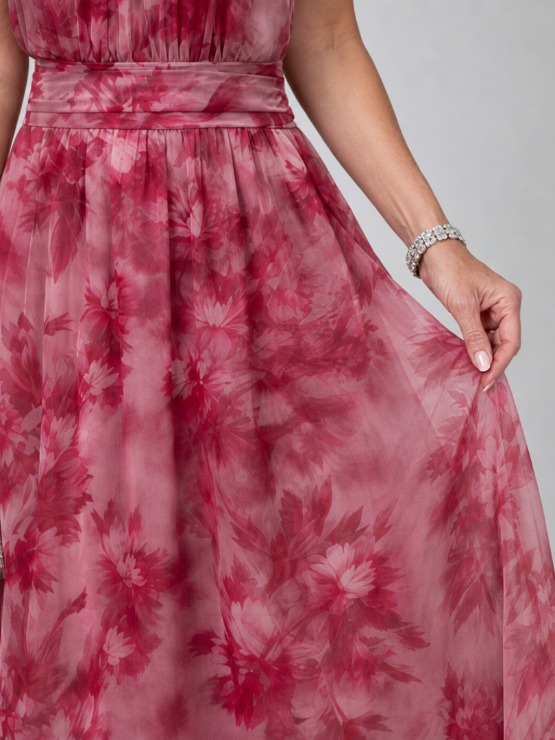 Women's elegant halter neck midi dress, perfect for occasion wear. Flowing & comfortable, a chic choice for summer.