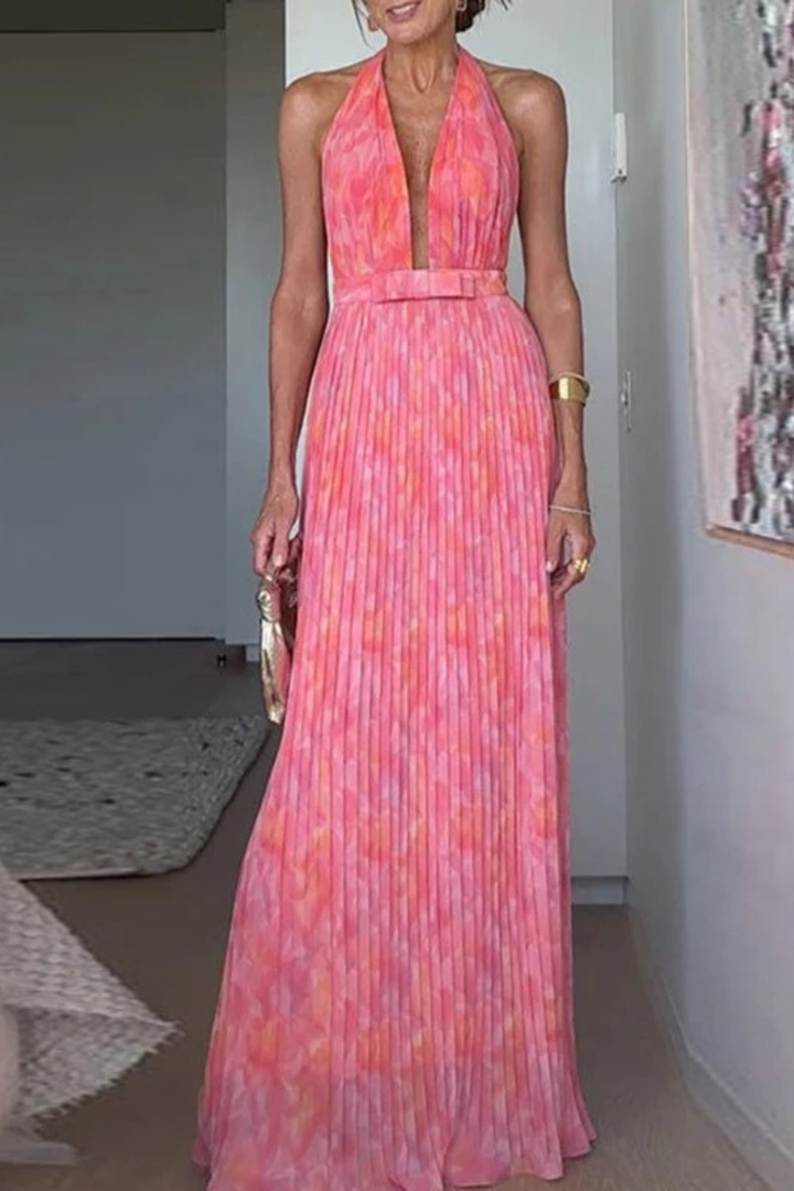 Chic halter neck pleated maxi dress for women, ideal as an elegant wedding guest or formal special occasion gown.