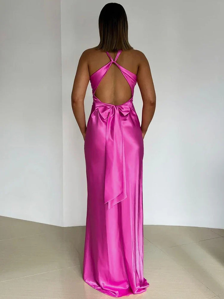 Luxurious women's halter neck satin evening gown, a sophisticated sleeveless maxi dress.
