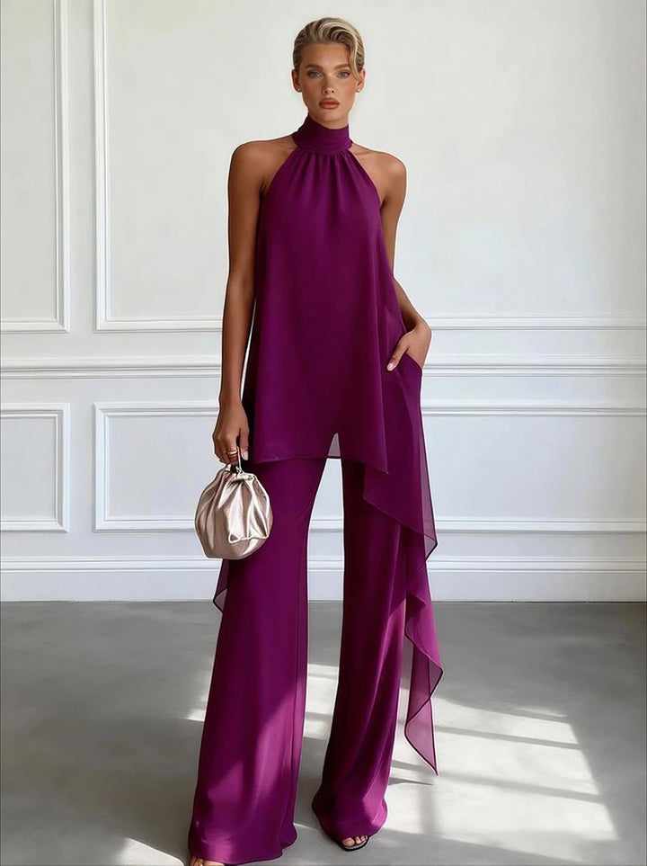 Elegant women's halter neck top & wide-leg trousers two-piece set for summer events like beach weddings.
