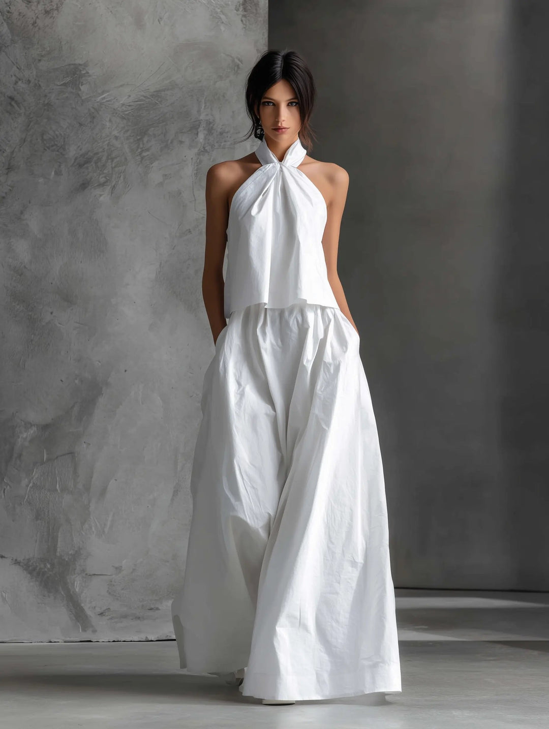 Coordinated women's halter neck two-piece set, a chic summer outfit for beach, resort, or vacation.