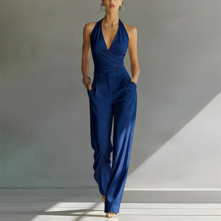 Flattering women's halter-neck wide-leg jumpsuit with high waist. Ideal for formal wear, party, & evening occasions.