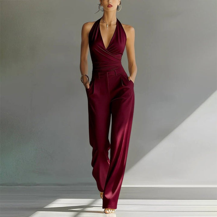 Sophisticated women's wide-leg halter-neck jumpsuit. An elegant choice for formal events, evening wear, and parties.