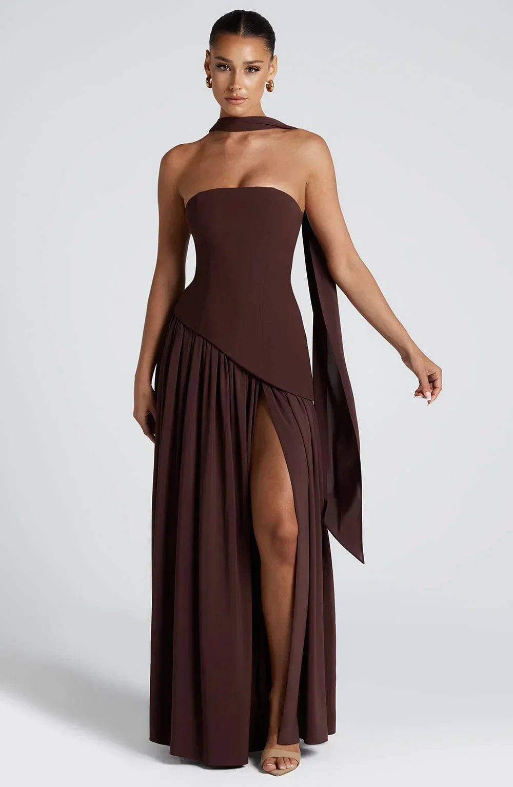 Elegant women's halterneck maxi dress with high split, perfect for wedding guests.