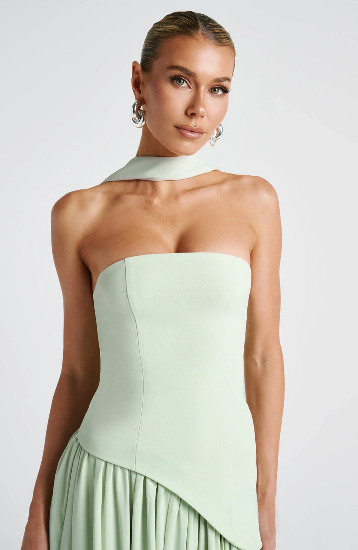 Beautiful women's party maxi dress, halterneck style with a sophisticated high split.
