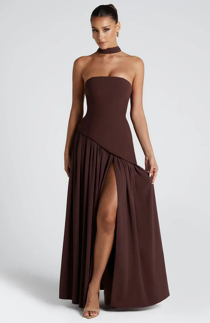 Chic women's evening dress, halterneck style with a dramatic high split for formal wear.