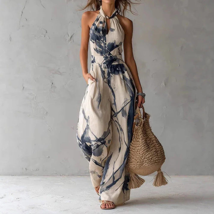 Chic women's halterneck wide leg jumpsuit. Perfect elegant summer fashion & resort wear.
