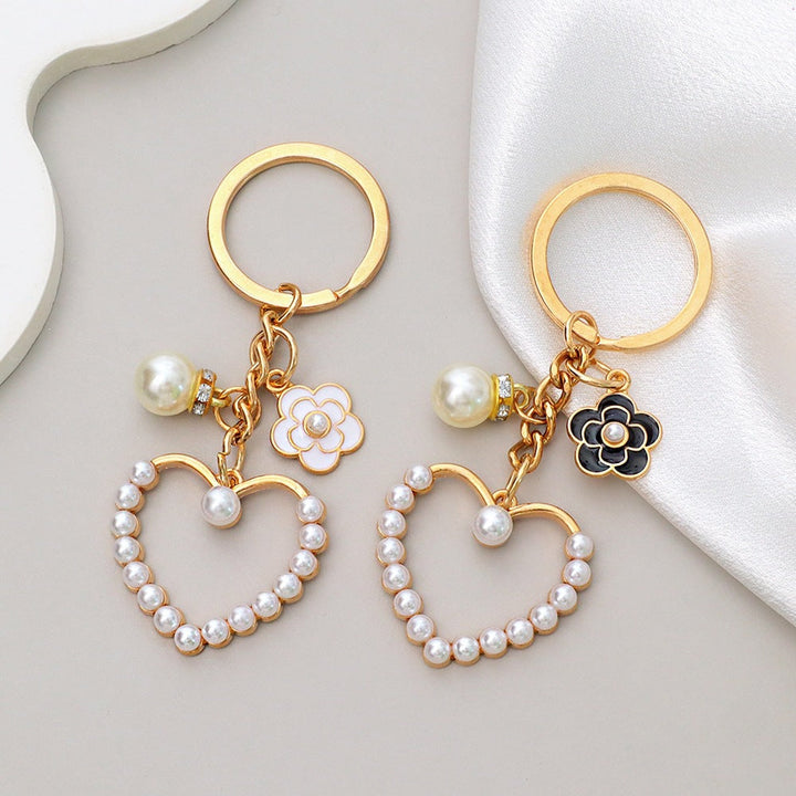 Beautiful heart and flower key holder, an elegant accessory for women's bags.
