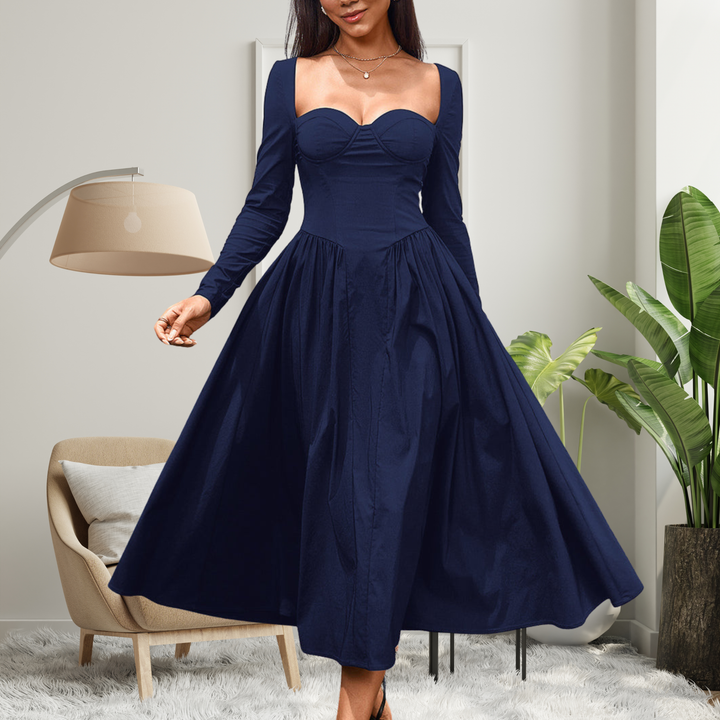A-line long sleeve maxi dress for women with a flattering heart neckline. Elegant for evening, chic for daytime wear.