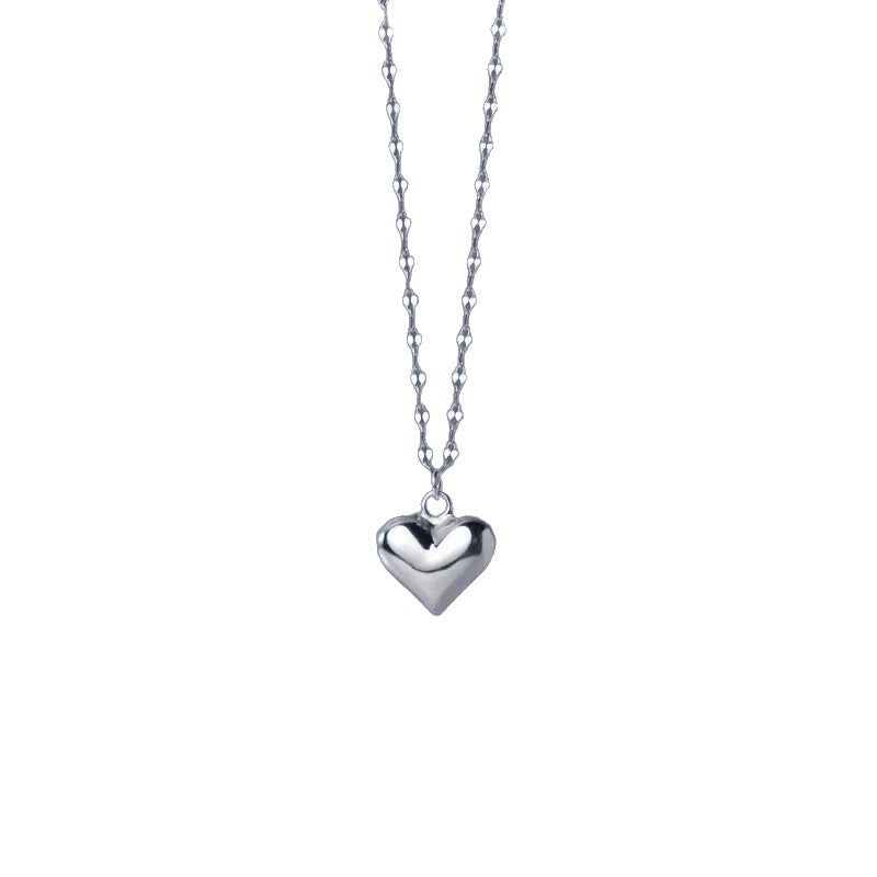 Classic heart-shaped pendant necklace, an elegant and cherished accessory for women, symbolizing affection.