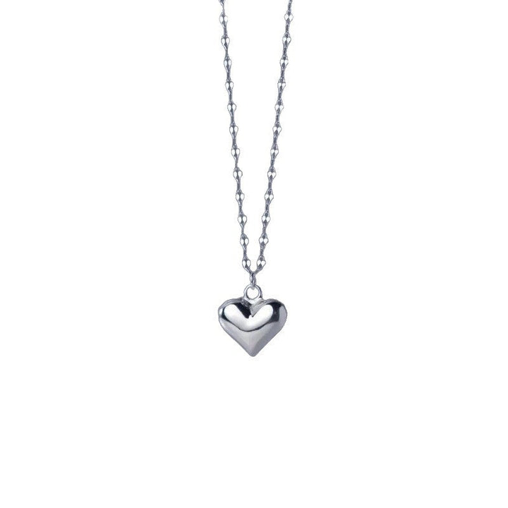 Classic heart-shaped pendant necklace, an elegant and cherished accessory for women, symbolizing affection.