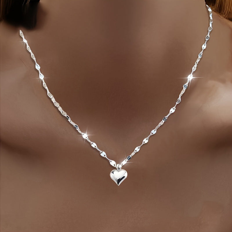 Shiny heart pendant necklace for women, an elegant love gift and a delicate addition to any jewelry collection.