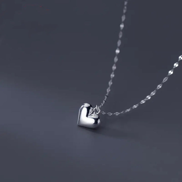 Versatile women's elegant heart pendant necklace, a graceful piece of jewelry perfect for any outfit.