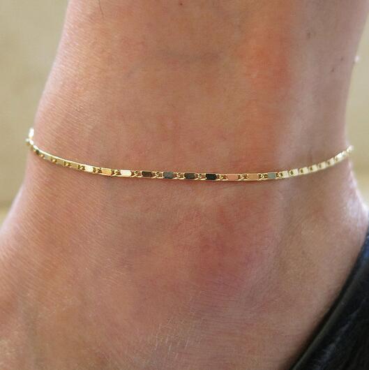 Polished metal heart pendant necklace, an elegant women's jewelry accessory that symbolizes love.