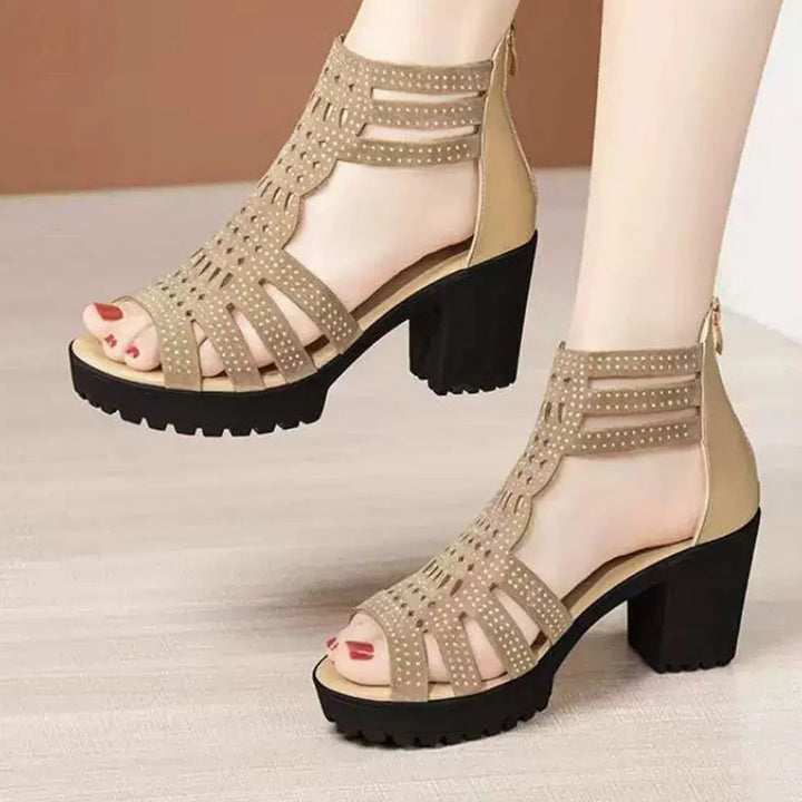 Fashionable women's heel sandals with elegant design. Offers stylish comfort for formal wear, parties, and evenings.