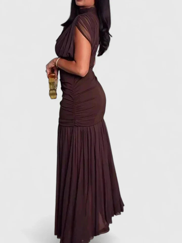 Sophisticated draped maxi dress with high neck for women. Ideal elegant spring/summer fashion.