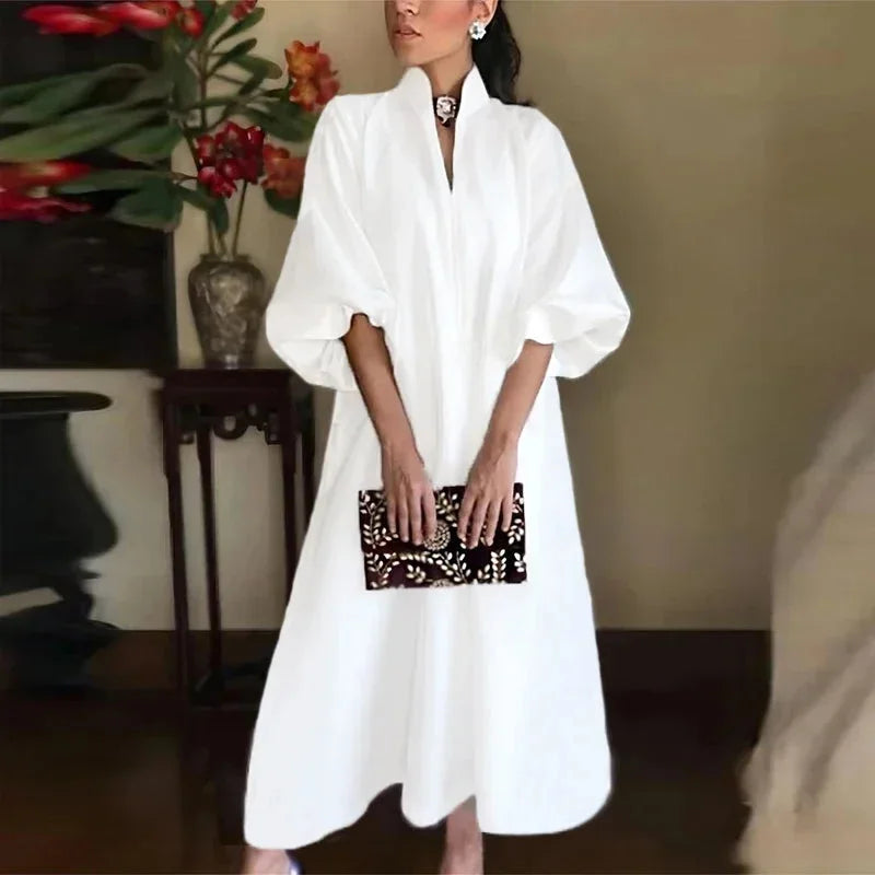 Elegant women's high-neck maxi dress with flowy balloon sleeves, perfect for casual or versatile summer style.