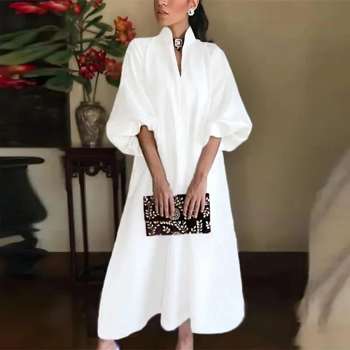 Elegant women's high-neck maxi dress with flowy balloon sleeves, perfect for casual or versatile summer style.