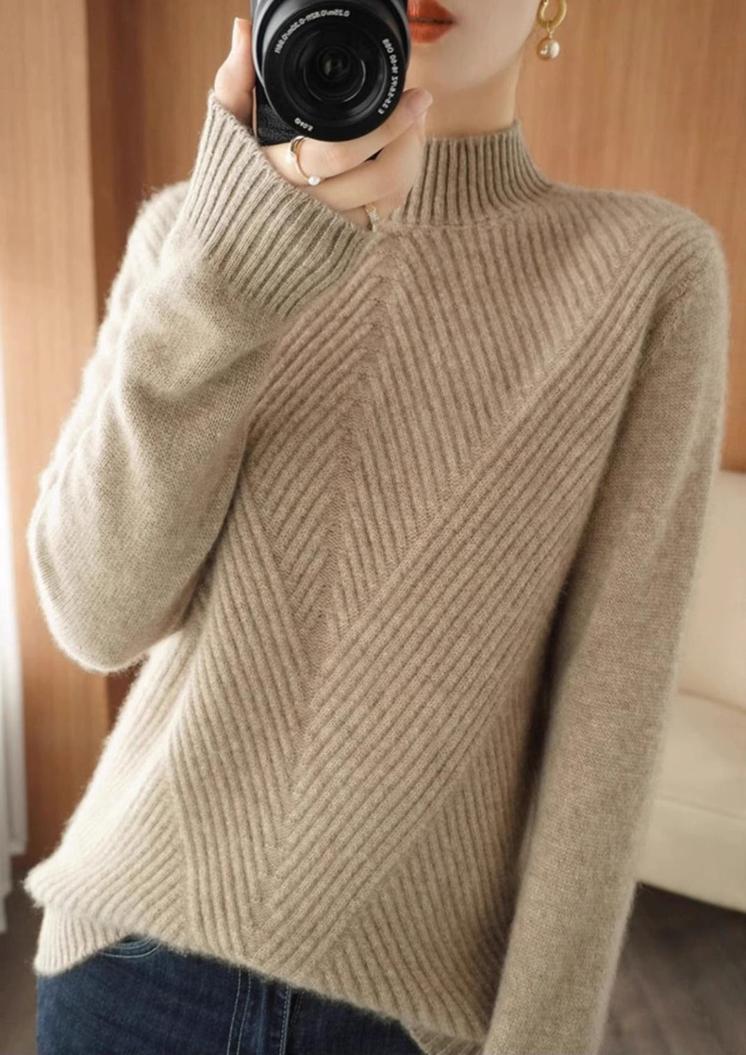 Elegant women's high neck sweater, perfect for fall fashion. Cozy, long sleeve top offering stylish comfort for winter.