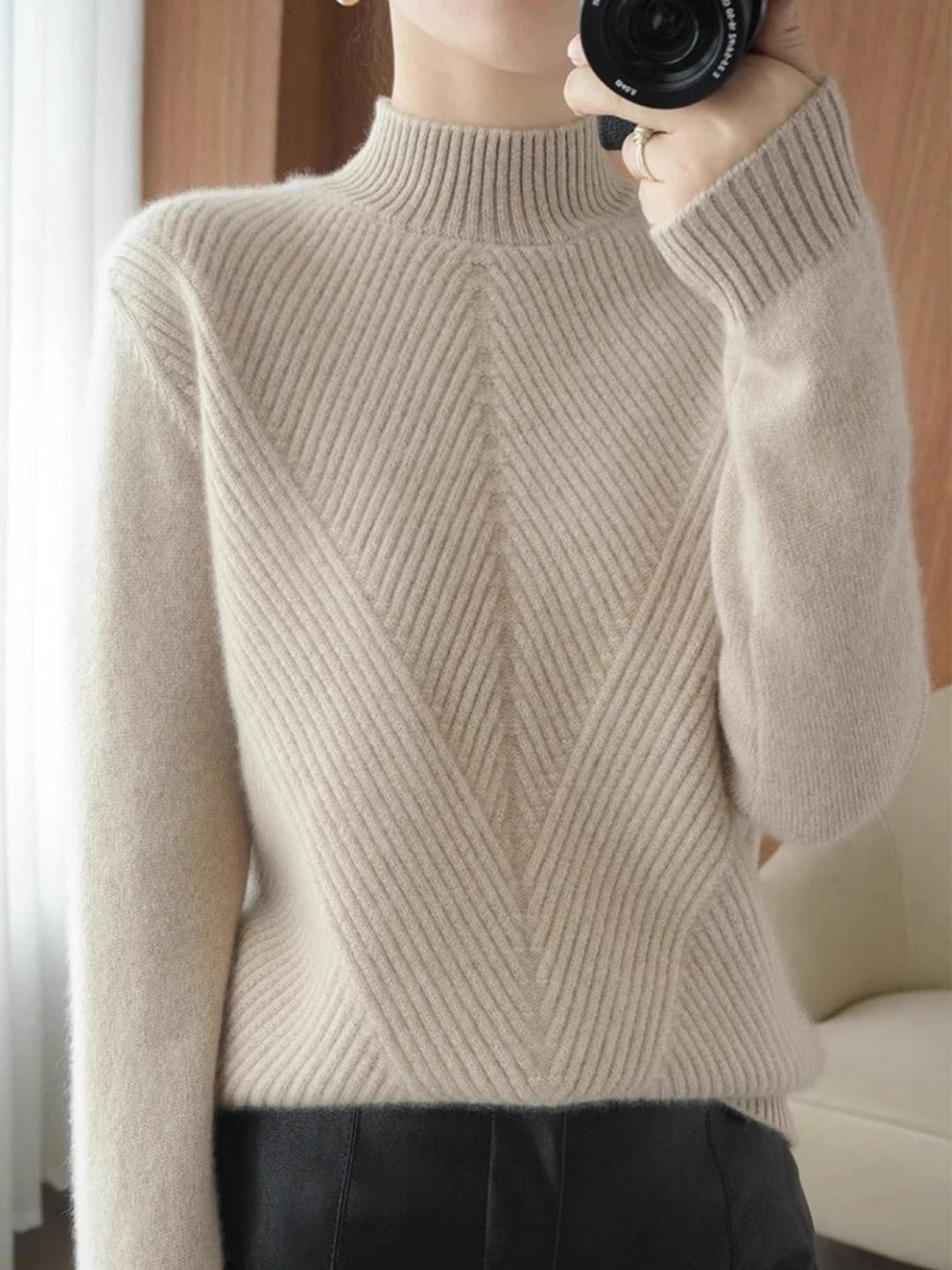 Cozy knit women's high neck sweater. Elegant long sleeve top, ideal for stylish fall fashion & comfortable winter wear.