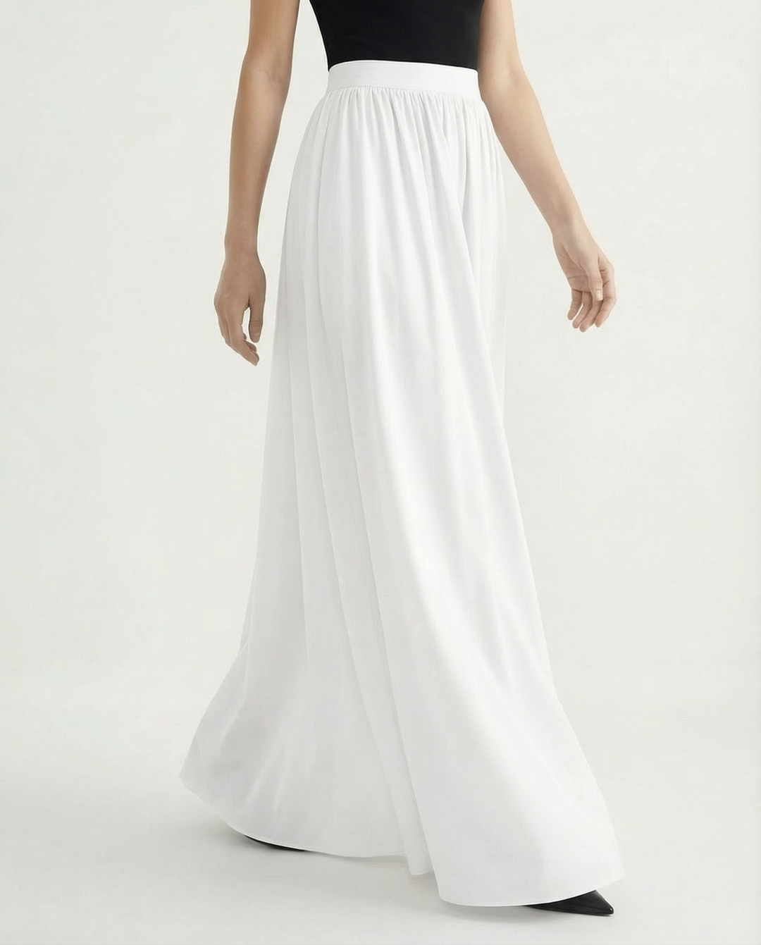 Versatile elegant high-waist maxi skirt, flowing silhouette for office or casual women's style.