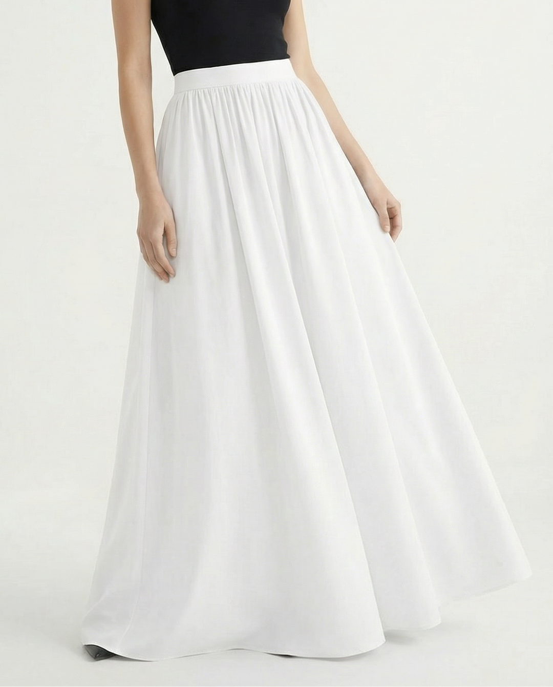 Graceful A-line high-waist maxi skirt for women, elegant flowing fabric, excellent for various looks.