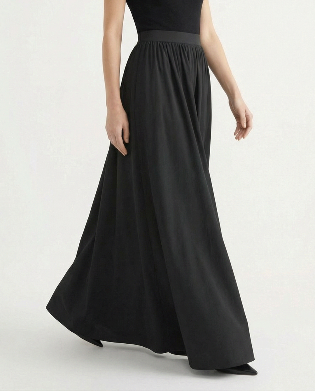 White elegant high-waist flowing maxi skirt, comfortable & stylish for warm weather.