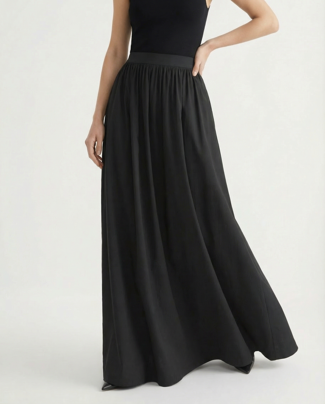 High-waist elegant maxi skirt, women's flowing design, great for minimalist fashion.