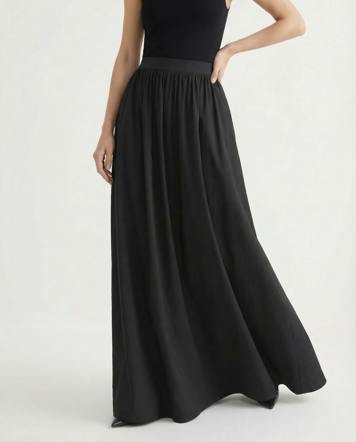 High-waist elegant maxi skirt, women's flowing design, great for minimalist fashion.