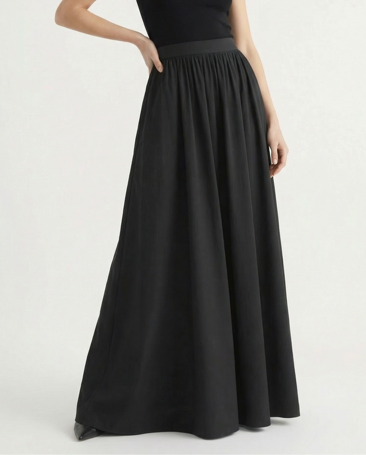 Casual elegant flowing maxi skirt, comfortable high-waist design for daily wear.