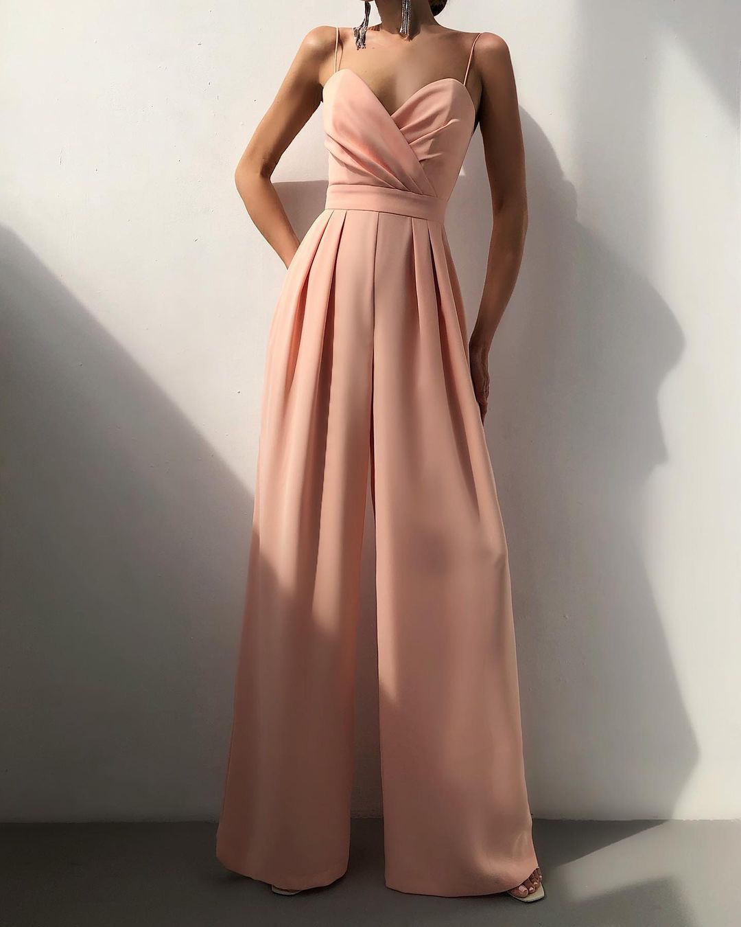 Stylish women's romper, high-waisted with a sweetheart neckline, a versatile elegant outfit.