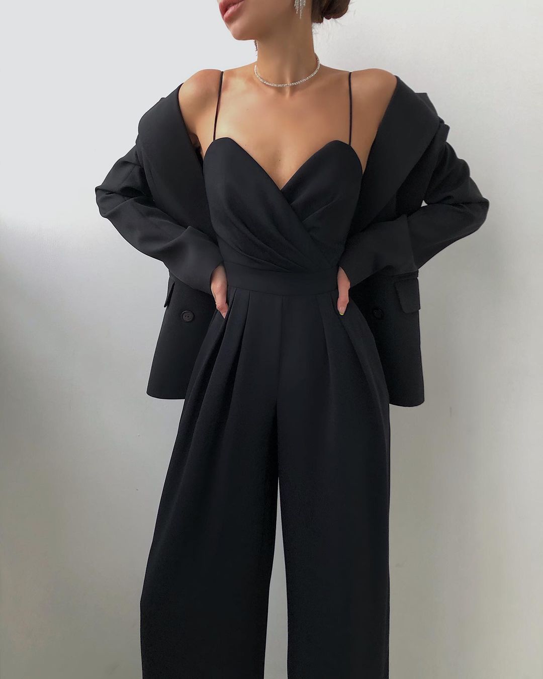 Chic wide-leg jumpsuit for women, featuring an elegant high waist and sweetheart neckline.