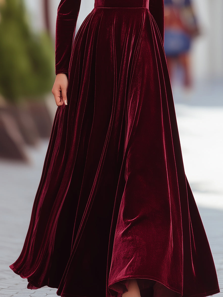 Stylish pleated high-waist maxi dress for women. Features elegant mock neck & long sleeves.