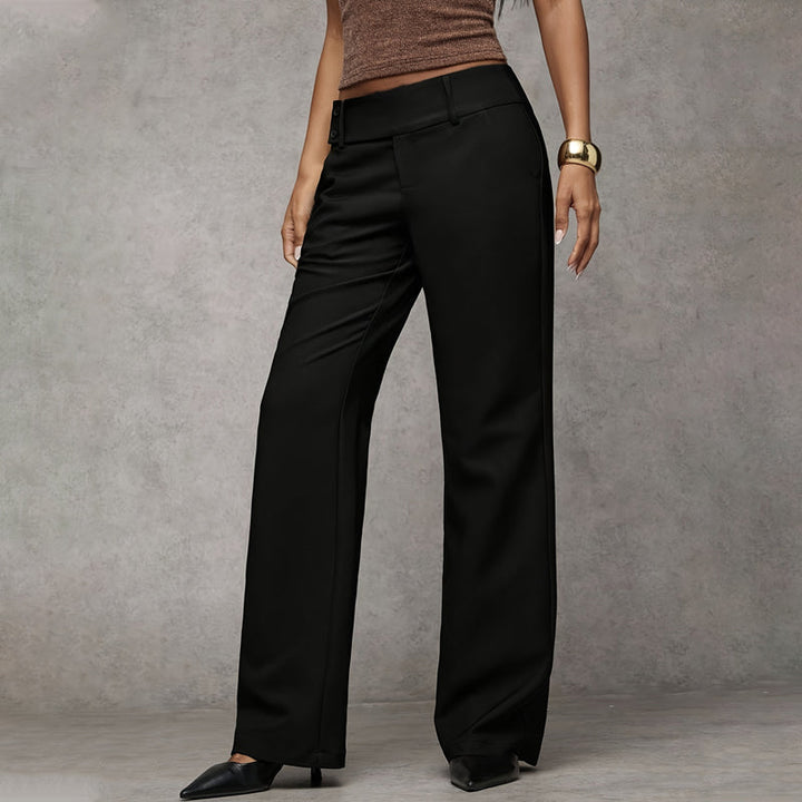 Women's high-waist wide-leg flared trousers styled with accessories, creating a chic ensemble.