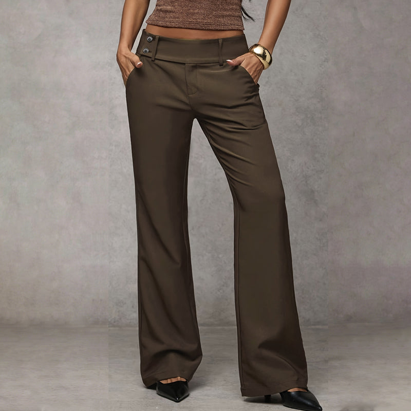 Casual women's high-waist wide-leg flared trousers paired with sneakers, effortless style.