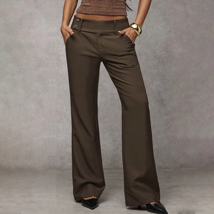 Casual women's high-waist wide-leg flared trousers paired with sneakers, effortless style.