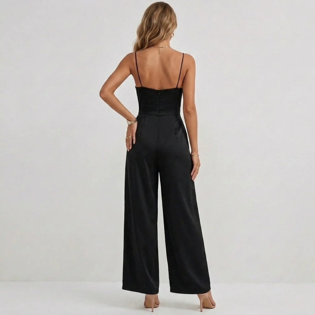 Chic women's wide-leg pleated jumpsuit, ideal for formal party wear & summer events. High-waisted design.