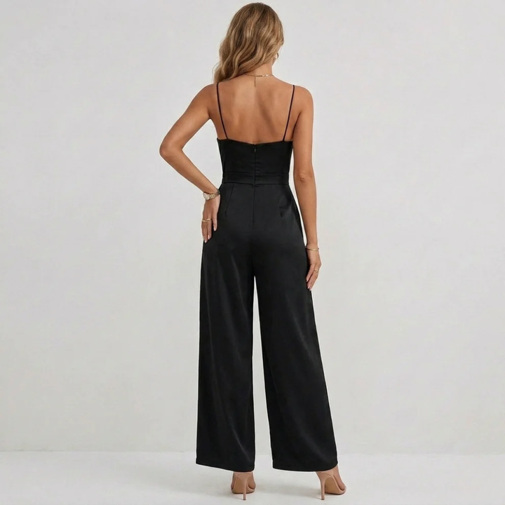 Chic women's wide-leg pleated jumpsuit, ideal for formal party wear & summer events. High-waisted design.