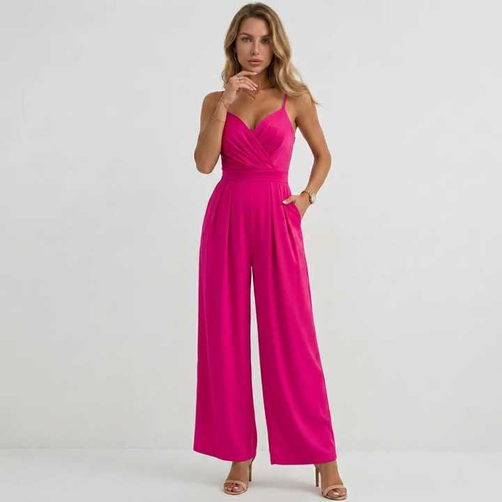 Stylish women's jumpsuit featuring a high-waisted wide-leg and elegant pleats, perfect for chic party outfits.