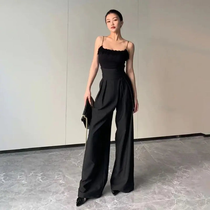 Stylish women's pleated high-waisted wide-leg trousers for an elegant look, suitable for office & casual.