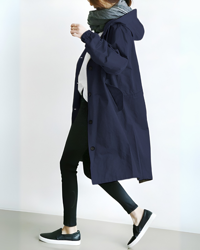 Classic women's hooded trench coat, perfect for elegant autumn & winter outerwear. Loose fit, timeless style & warmth.