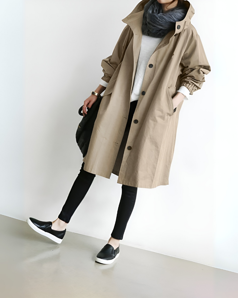 Versatile women's elegant hooded trench coat. Loose fit, long sleeve, single-breasted design for classic autumn/winter outerwear.